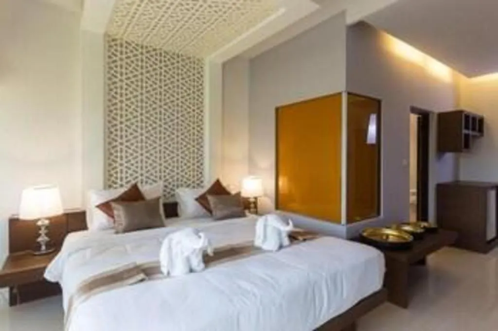 Bed in Vulcano Hotel at Nimman