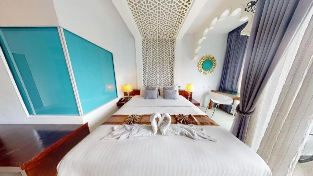 Bed in Vulcano Hotel at Nimman