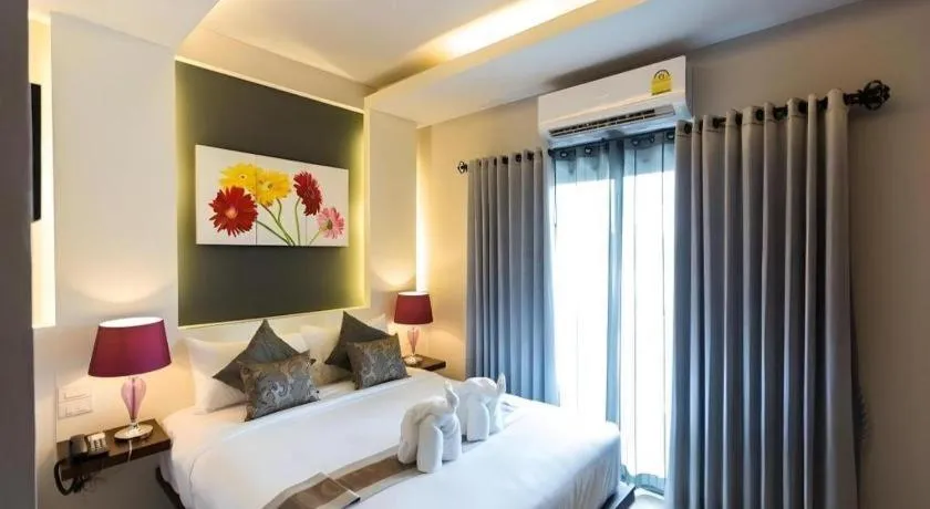 Bed in Vulcano Hotel at Nimman