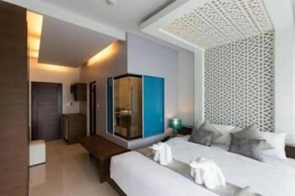 Bed in Vulcano Hotel at Nimman