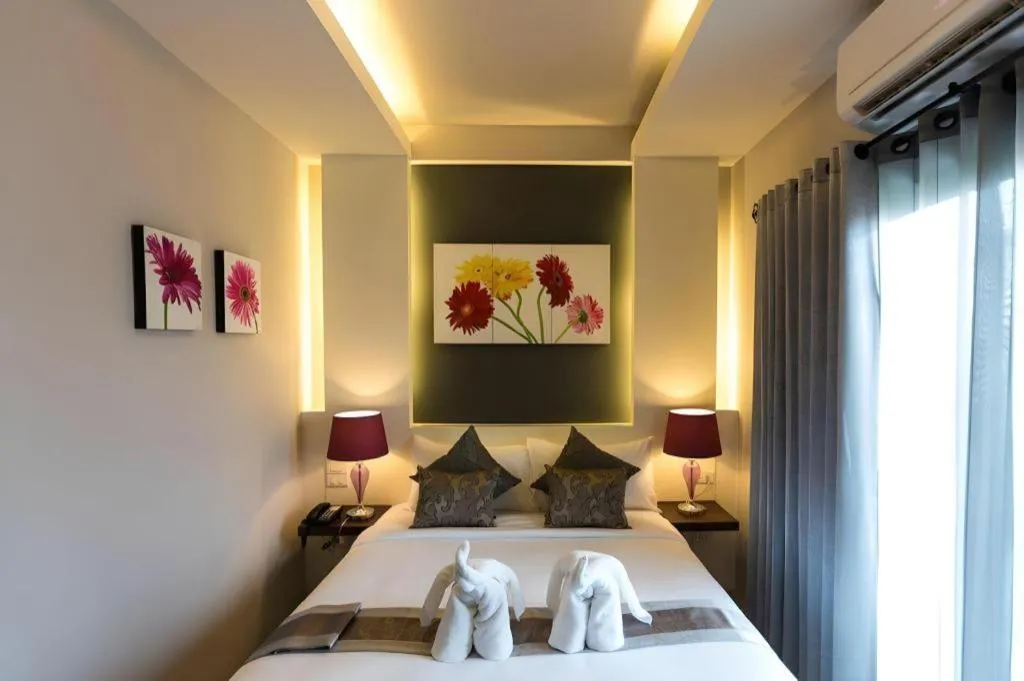 Bed in Vulcano Hotel at Nimman