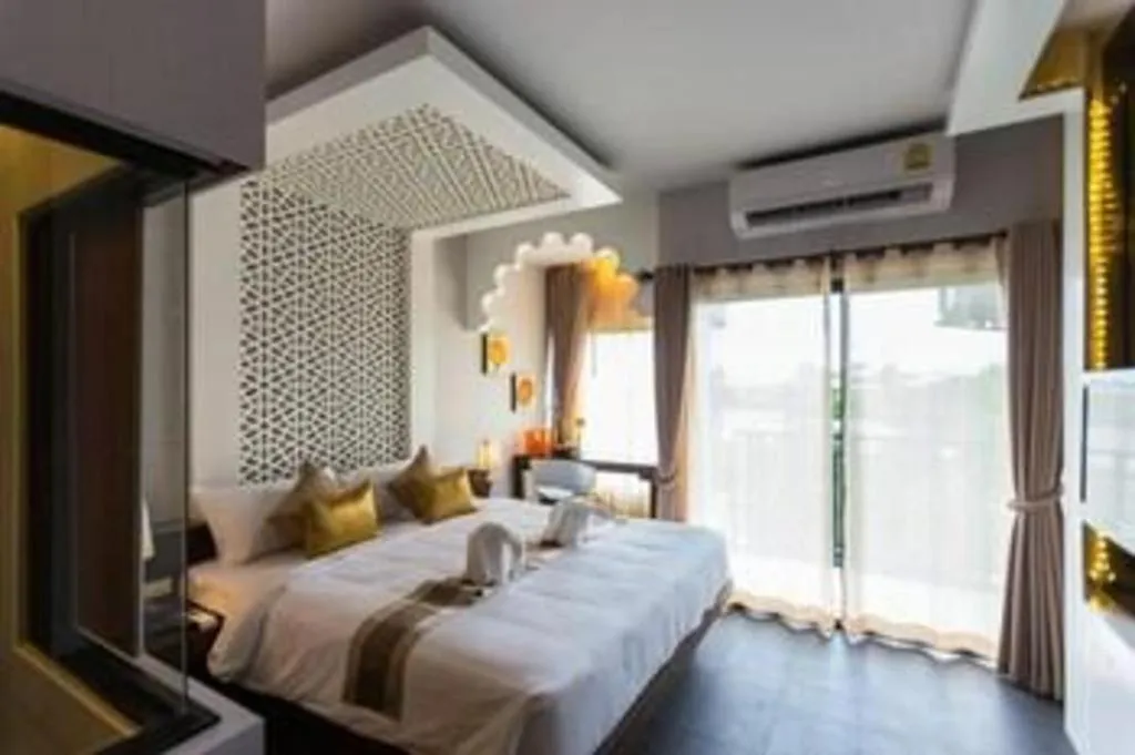 Bed in Vulcano Hotel at Nimman