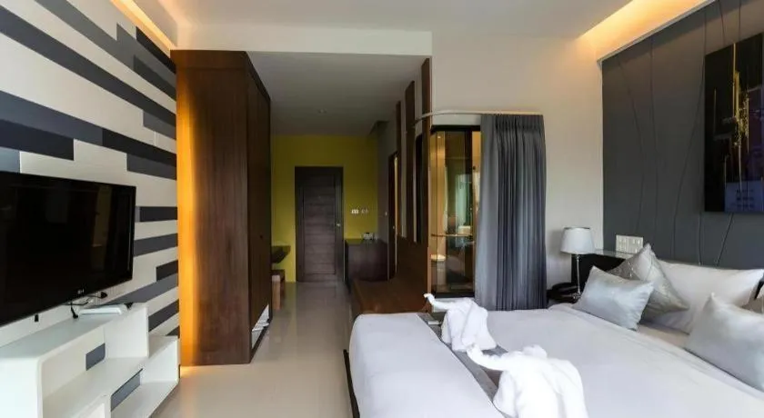 Bed in Vulcano Hotel at Nimman