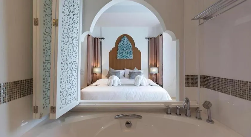 Bed in Vulcano Hotel at Nimman