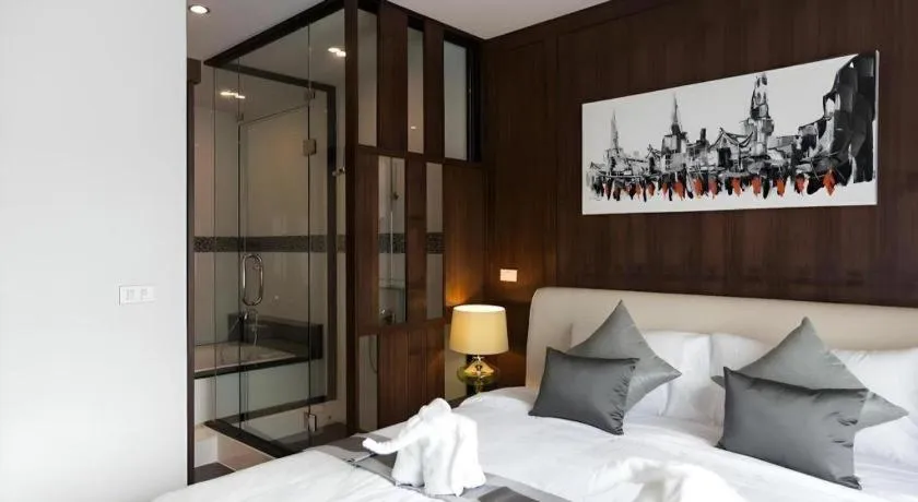 Bed in Vulcano Hotel at Nimman