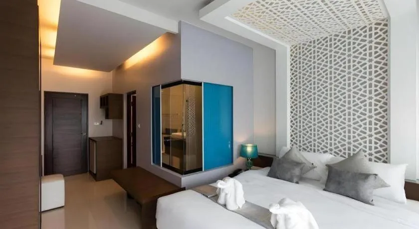 Bed in Vulcano Hotel at Nimman