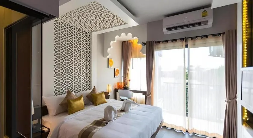 Bed in Vulcano Hotel at Nimman