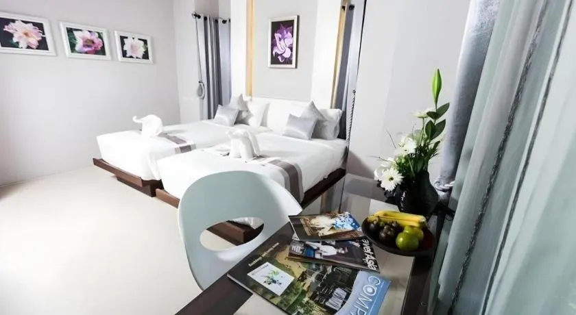 Bed in Vulcano Hotel at Nimman