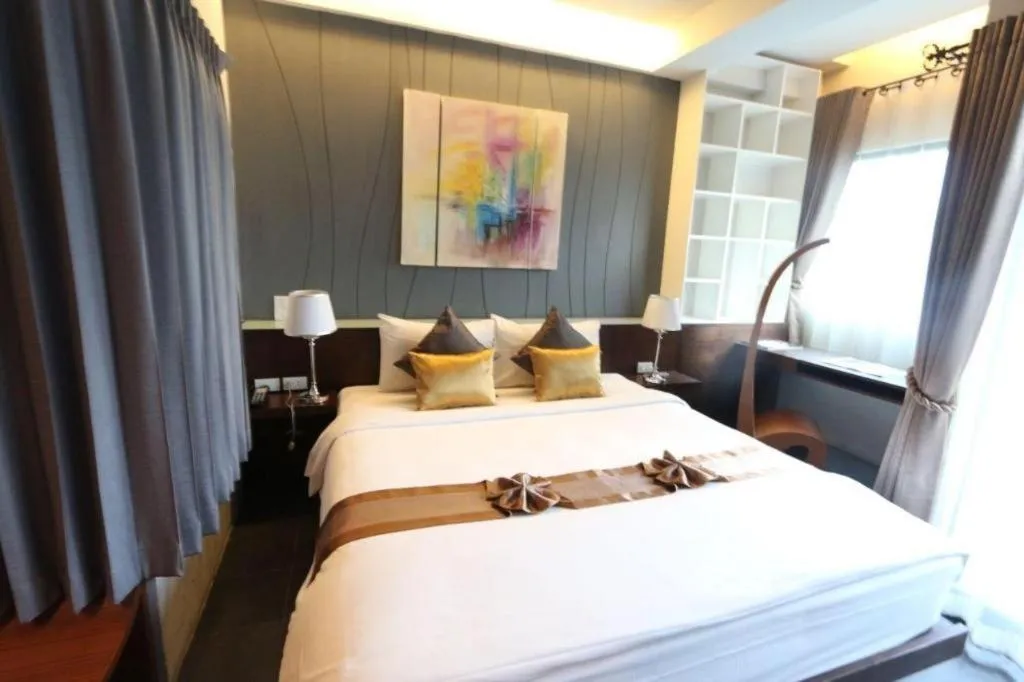 Bed in Vulcano Hotel at Nimman