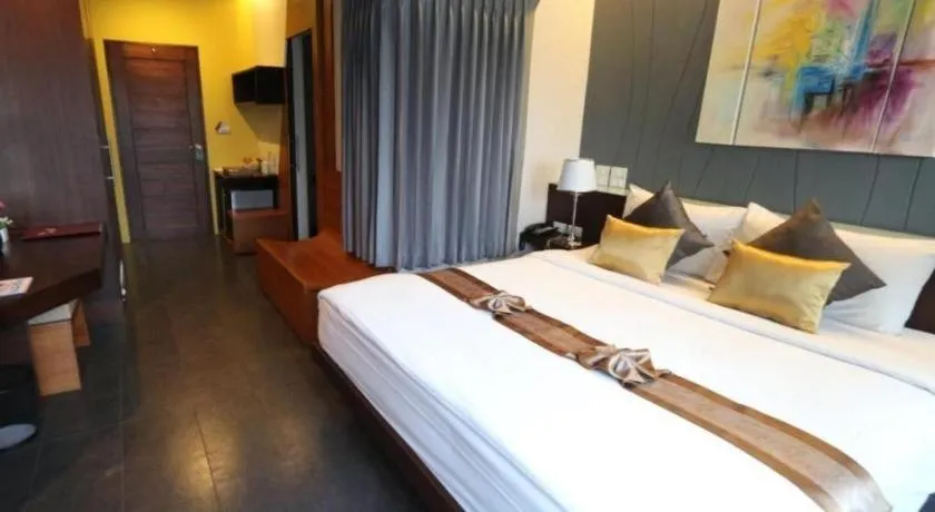 Bed in Vulcano Hotel at Nimman