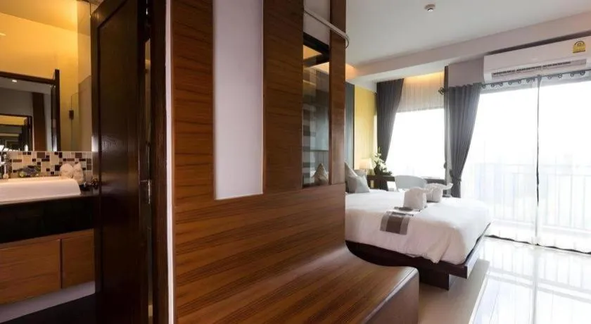 Bed in Vulcano Hotel at Nimman