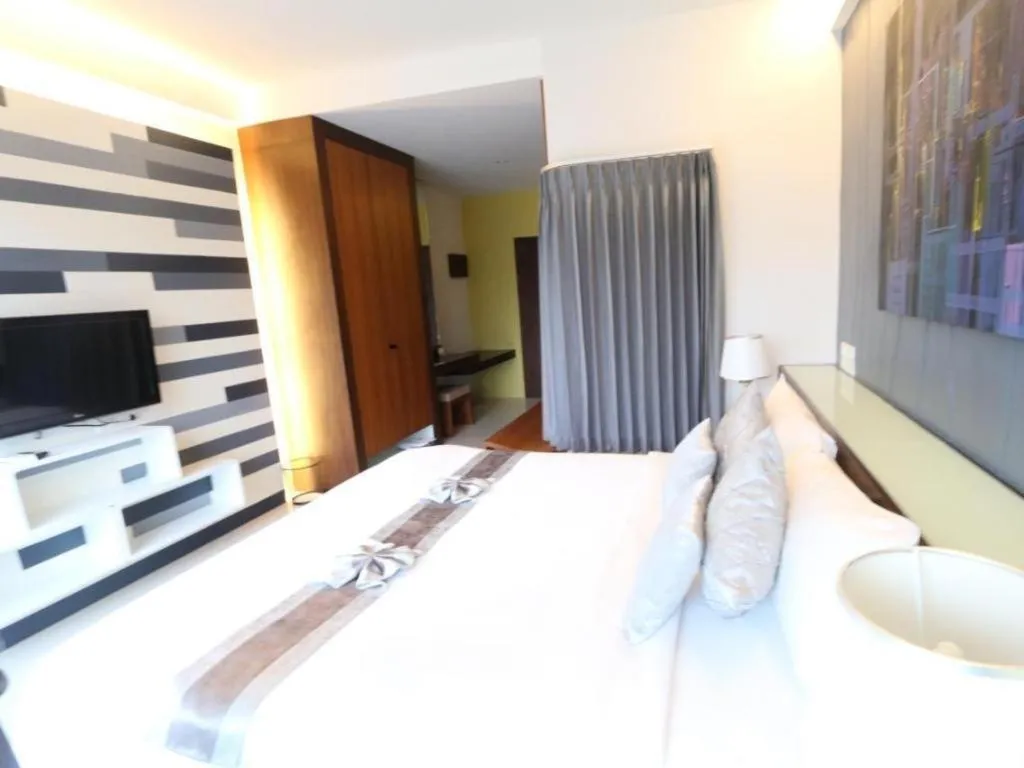 Bed in Vulcano Hotel at Nimman