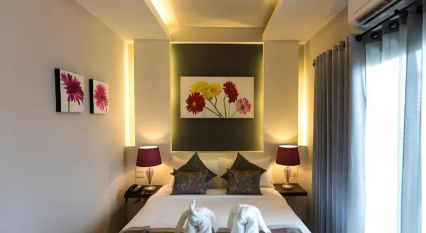 Bed in Vulcano Hotel at Nimman