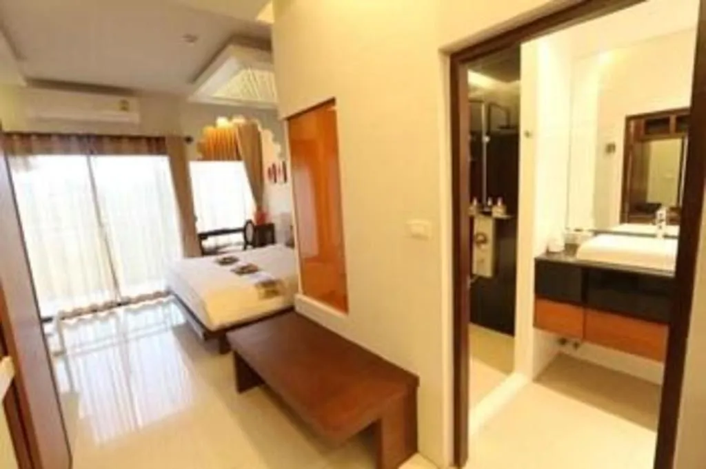 Bed in Vulcano Hotel at Nimman