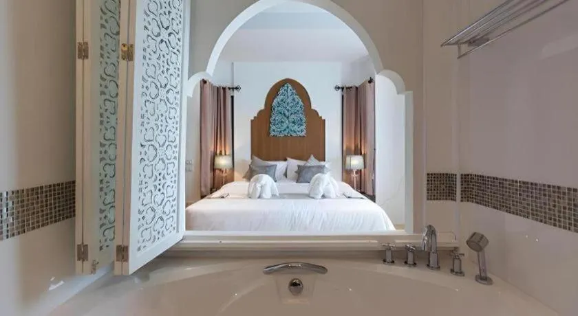 Bed in Vulcano Hotel at Nimman