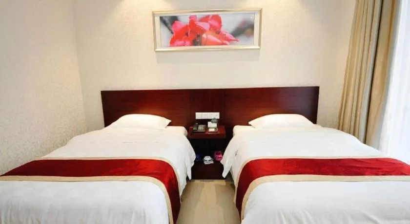 Bed in Nanfang Dasha Hotel