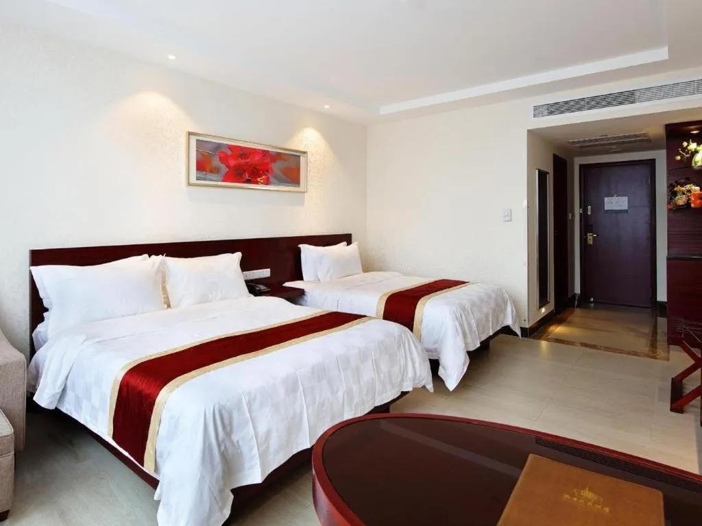 Bed in Nanfang Dasha Hotel