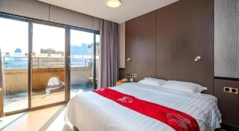 Bed in Nanfang Dasha Hotel