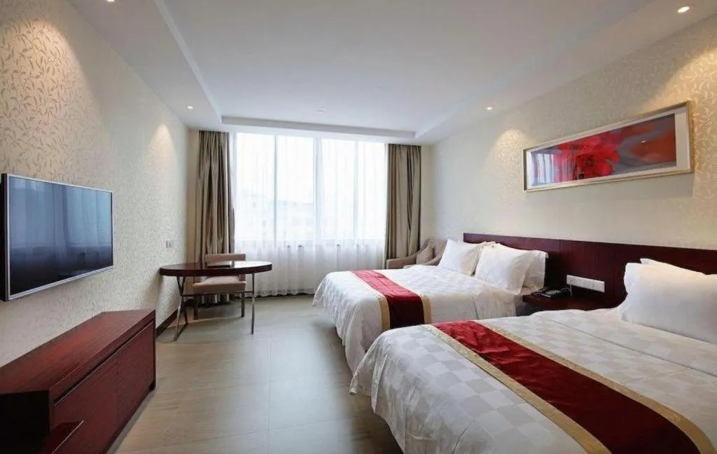 Bed in Nanfang Dasha Hotel