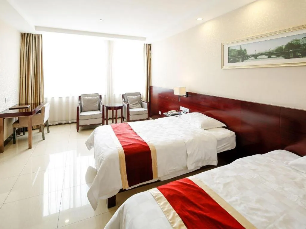 Bed in Nanfang Dasha Hotel