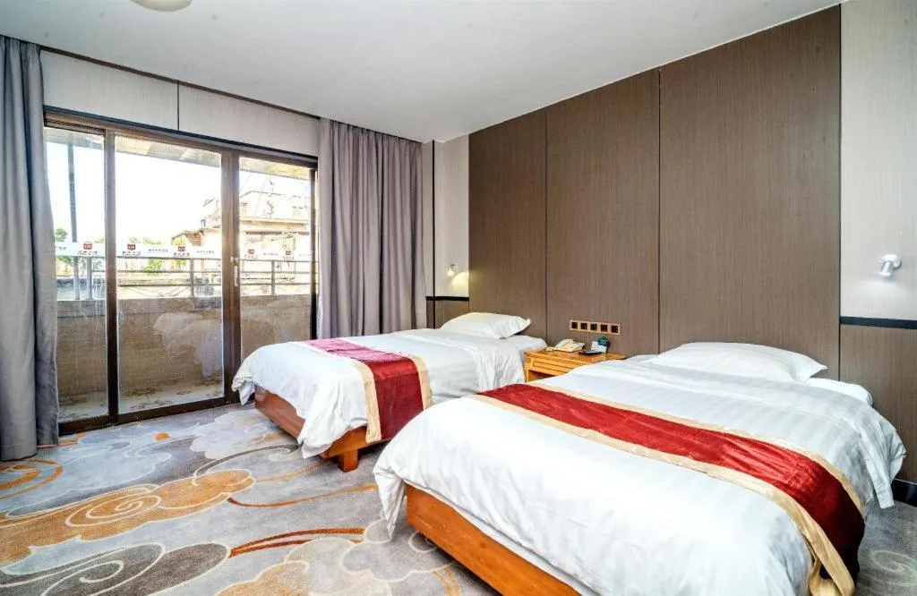 Bed in Nanfang Dasha Hotel