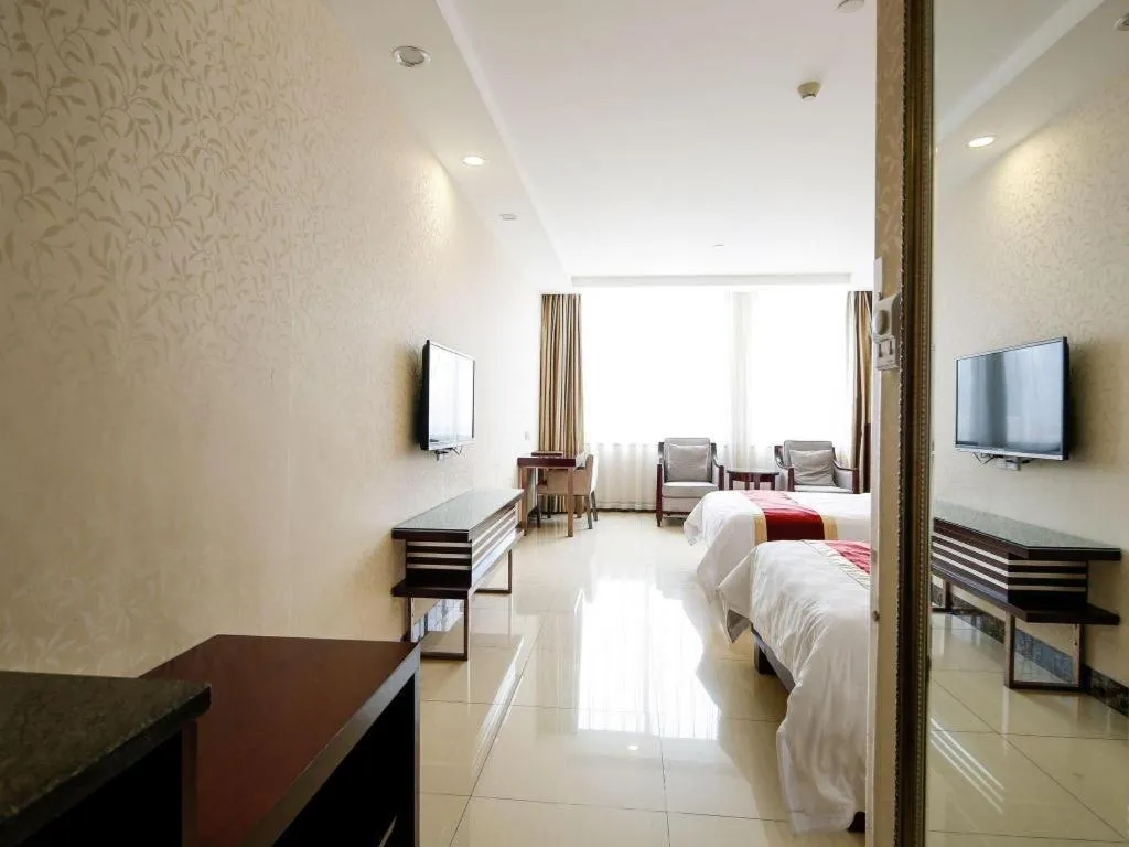 Bed in Nanfang Dasha Hotel