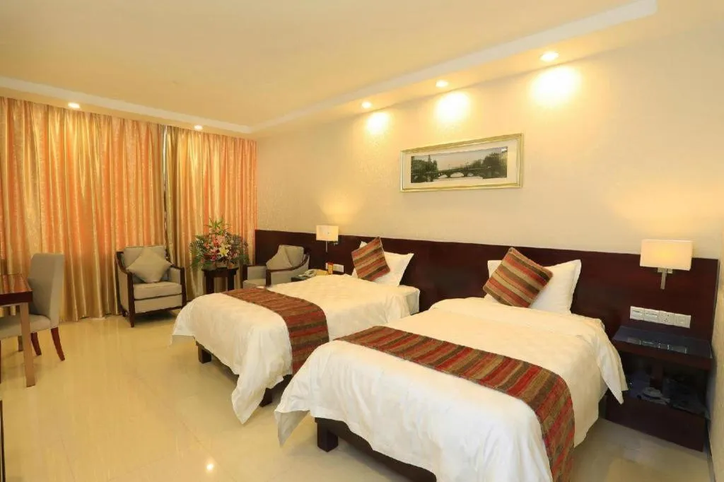 Bed in Nanfang Dasha Hotel