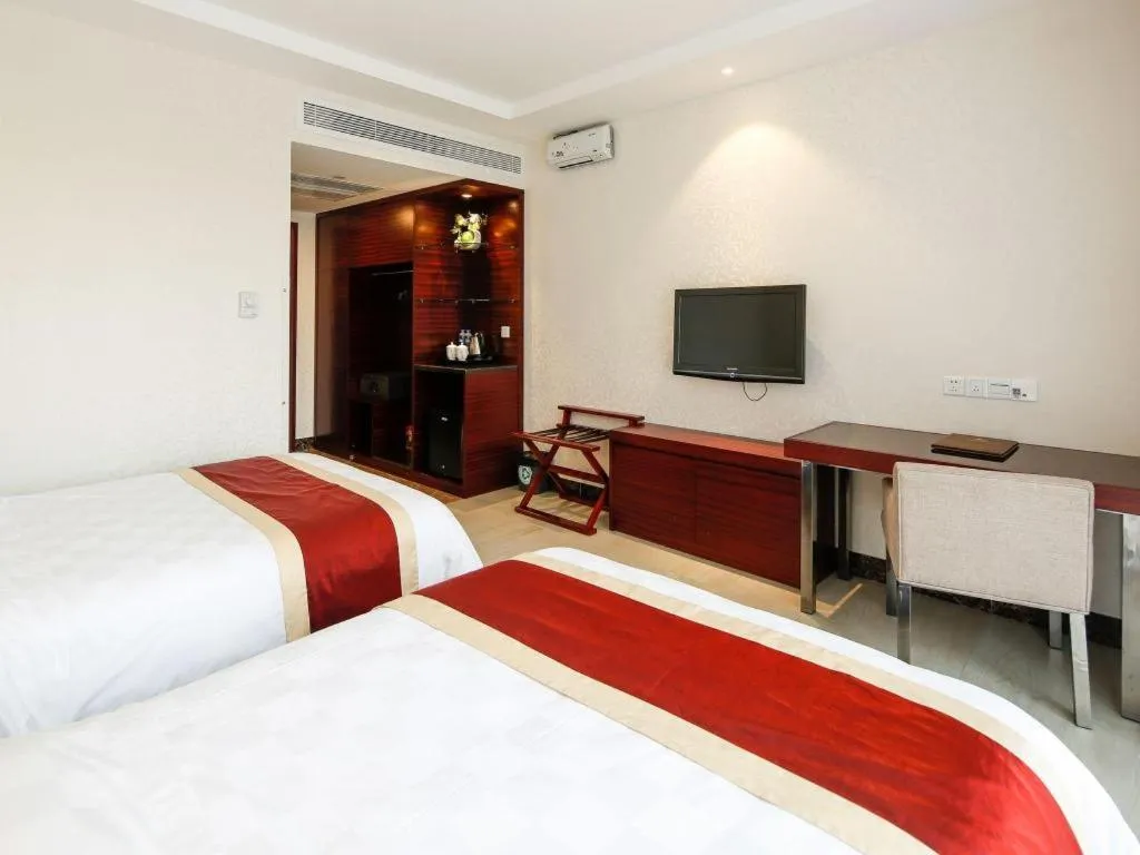 Bed in Nanfang Dasha Hotel