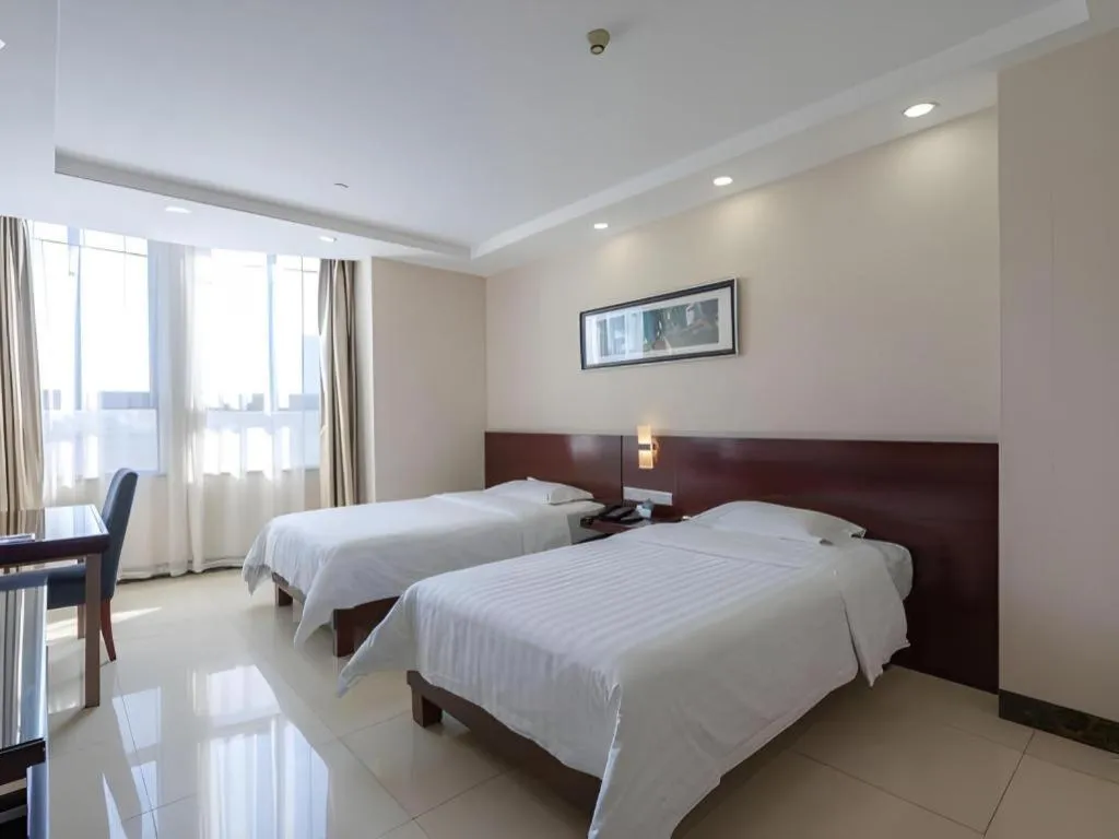 Bed in Nanfang Dasha Hotel