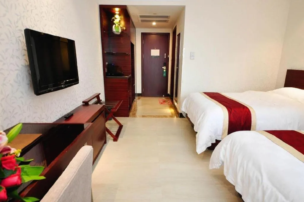 Bed in Nanfang Dasha Hotel