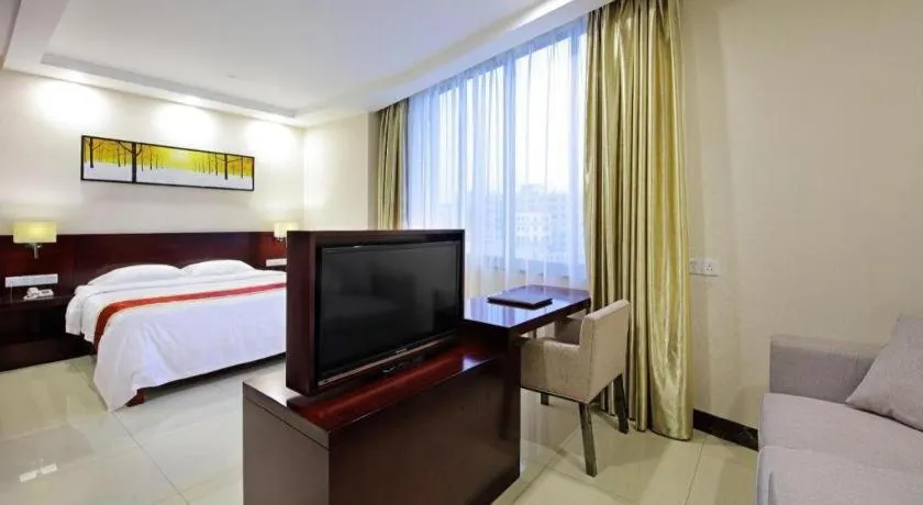 Bed in Nanfang Dasha Hotel