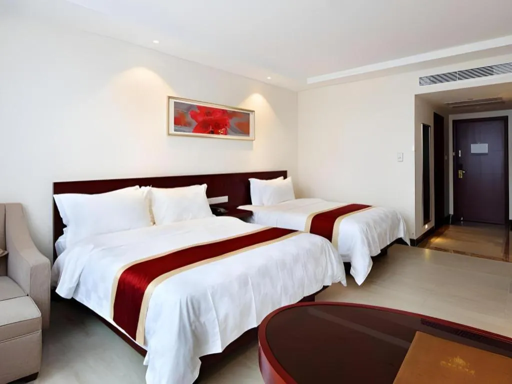 Bed in Nanfang Dasha Hotel