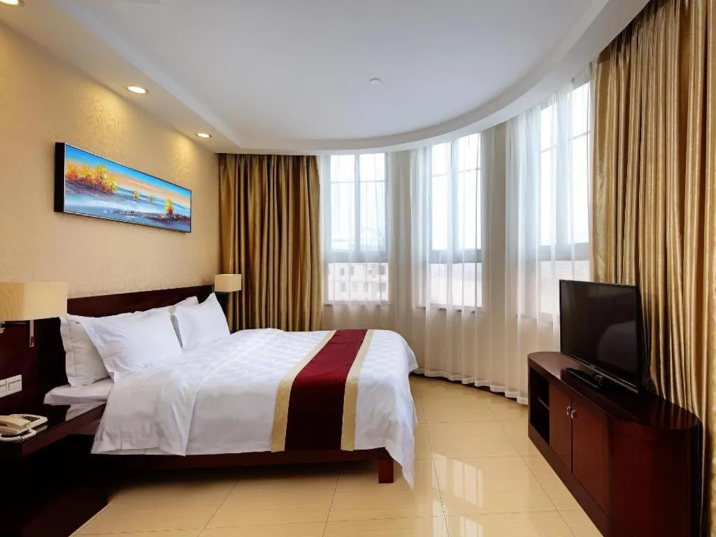 Bed in Nanfang Dasha Hotel