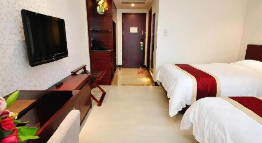 Bed in Nanfang Dasha Hotel