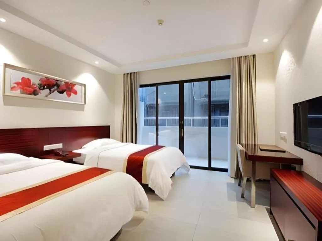 Bed in Nanfang Dasha Hotel