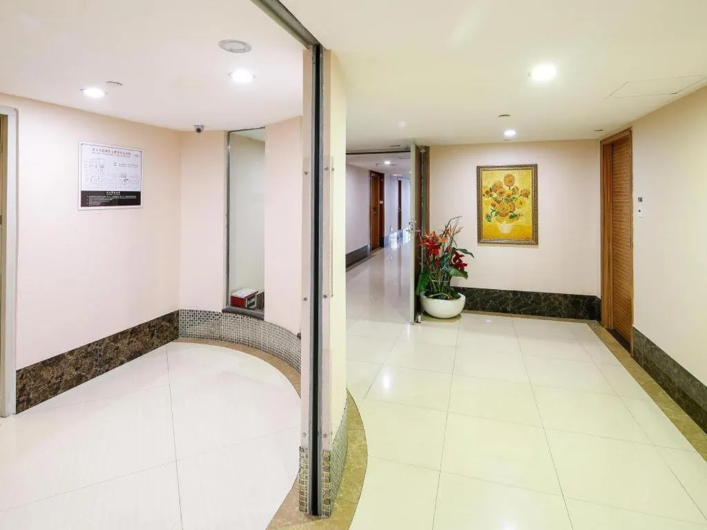 Bed in Nanfang Dasha Hotel