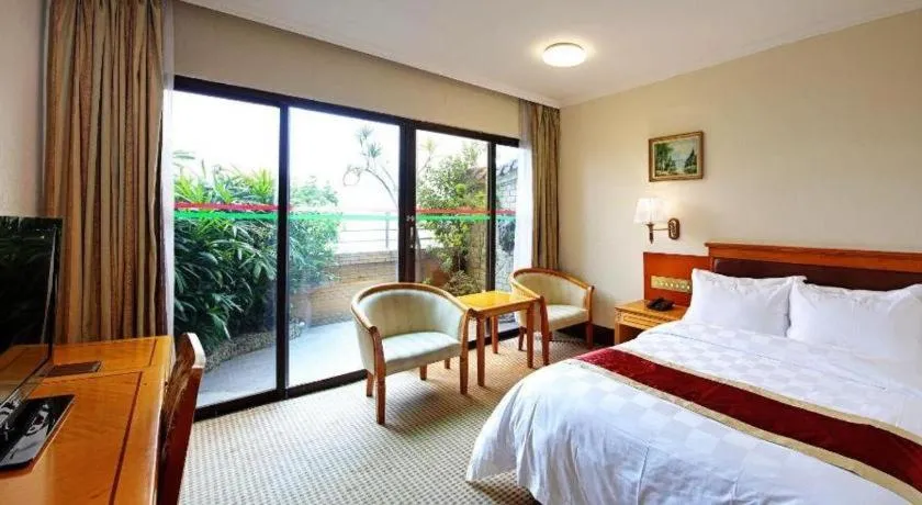 Bed in Nanfang Dasha Hotel