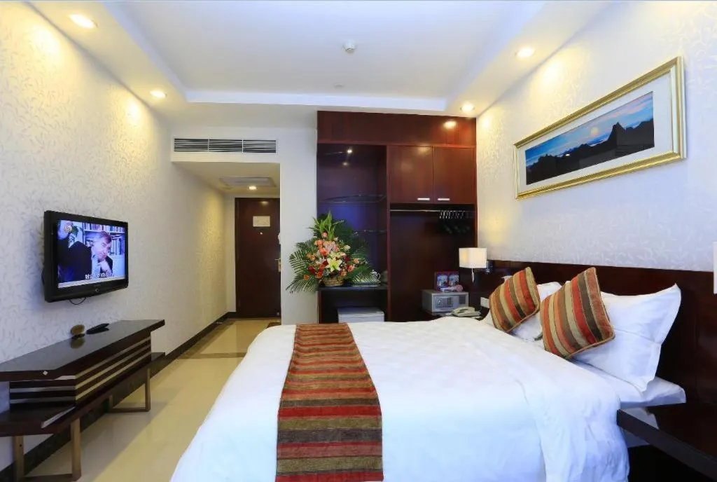 Bed in Nanfang Dasha Hotel