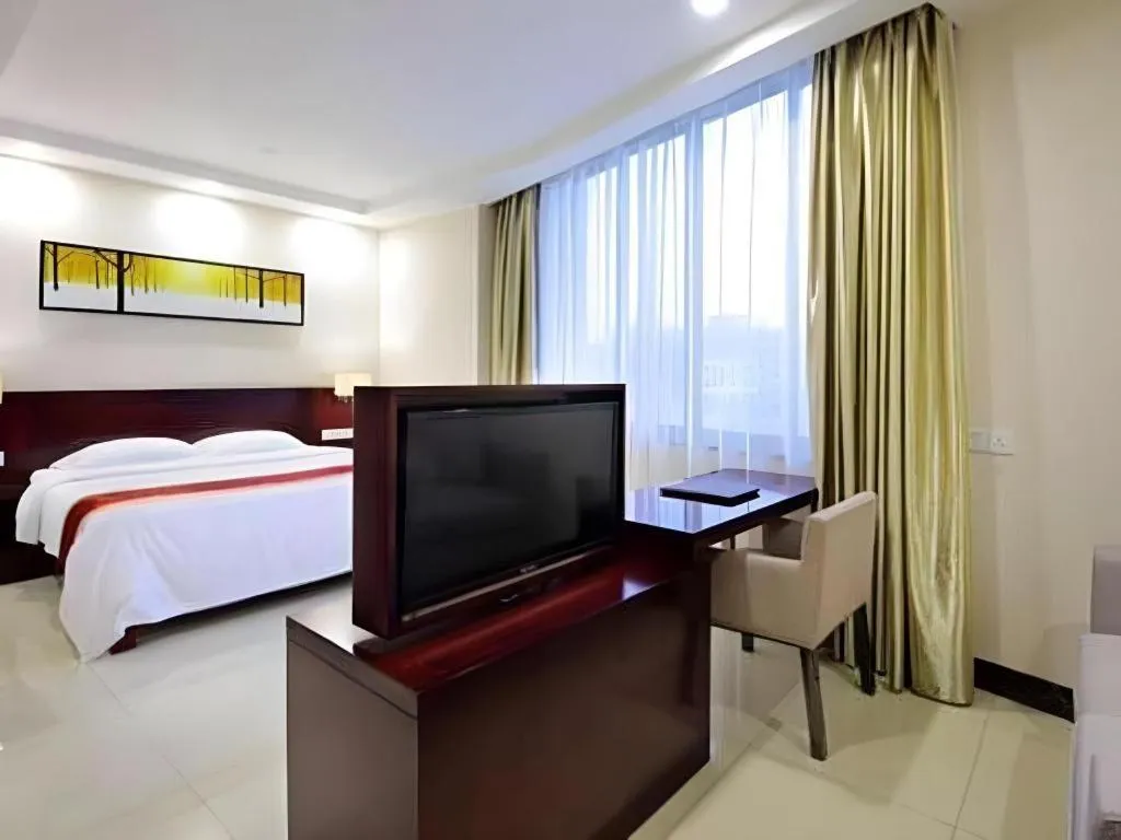 Bed in Nanfang Dasha Hotel