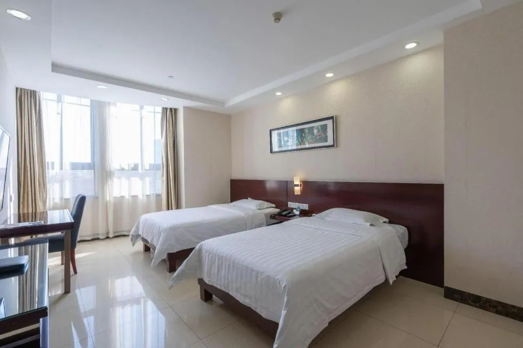 Bed in Nanfang Dasha Hotel