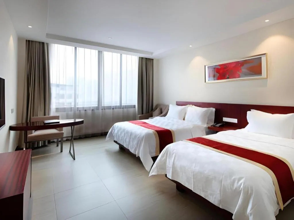 Bed in Nanfang Dasha Hotel