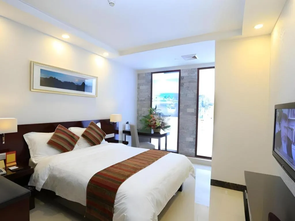 Bed in Nanfang Dasha Hotel