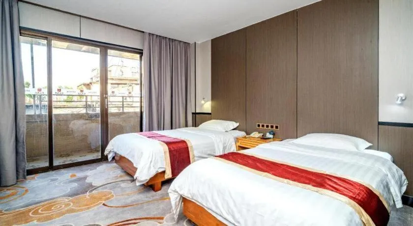 Bed in Nanfang Dasha Hotel