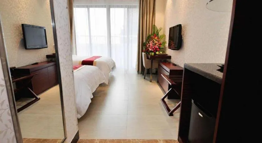 Bed in Nanfang Dasha Hotel