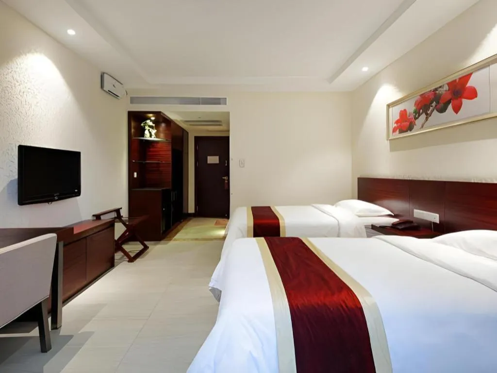 Bed in Nanfang Dasha Hotel