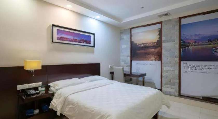 Bed in Nanfang Dasha Hotel