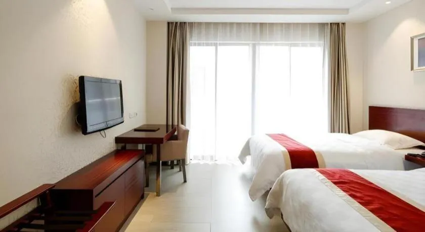 Bed in Nanfang Dasha Hotel