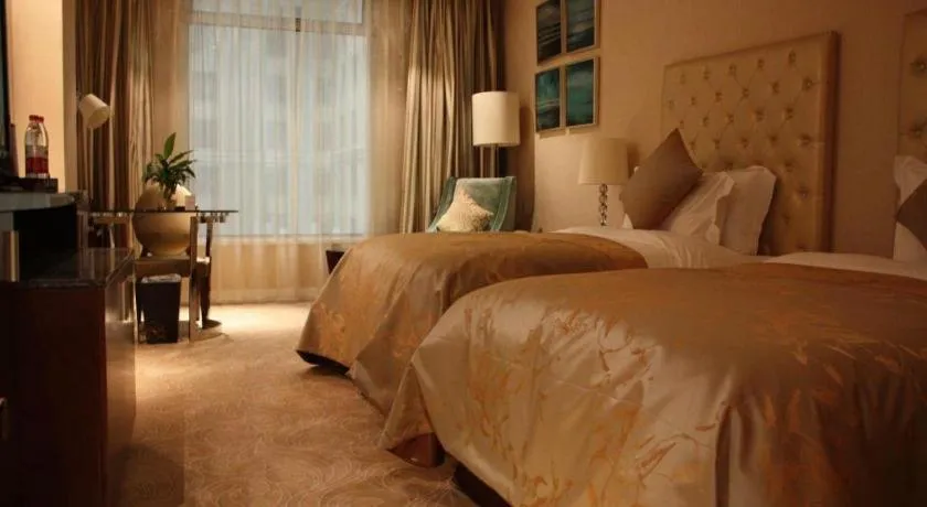 Bed in Dongfang Jianguo Hotel Wuhan