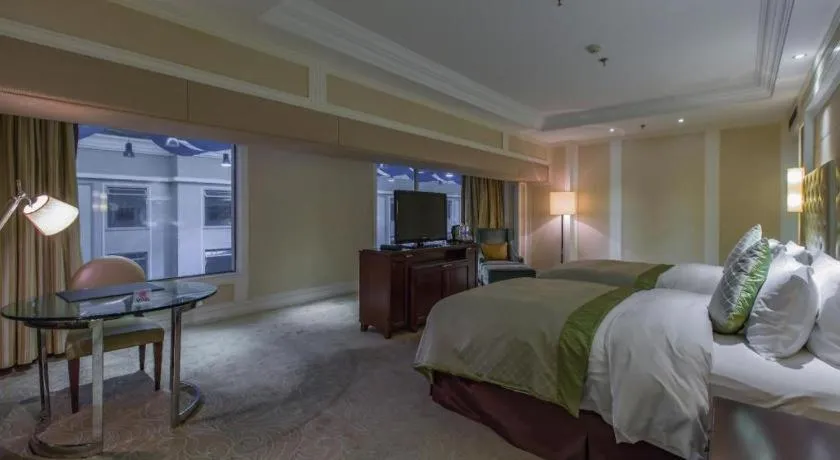 Bed in Dongfang Jianguo Hotel Wuhan