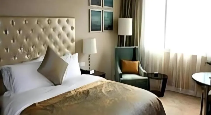 Bed in Dongfang Jianguo Hotel Wuhan